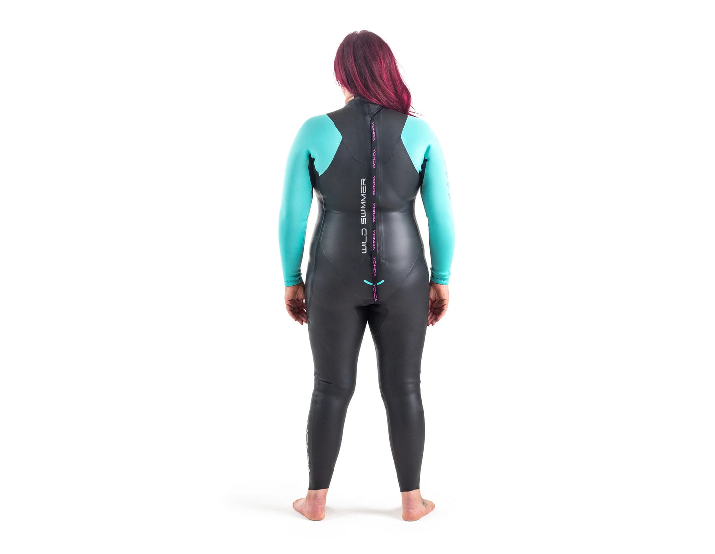 Back view of a women wearing a Spook Wetsuit by Yonda. A beginners Wild Swimming Wetsuit. It is black with aqua arms. 