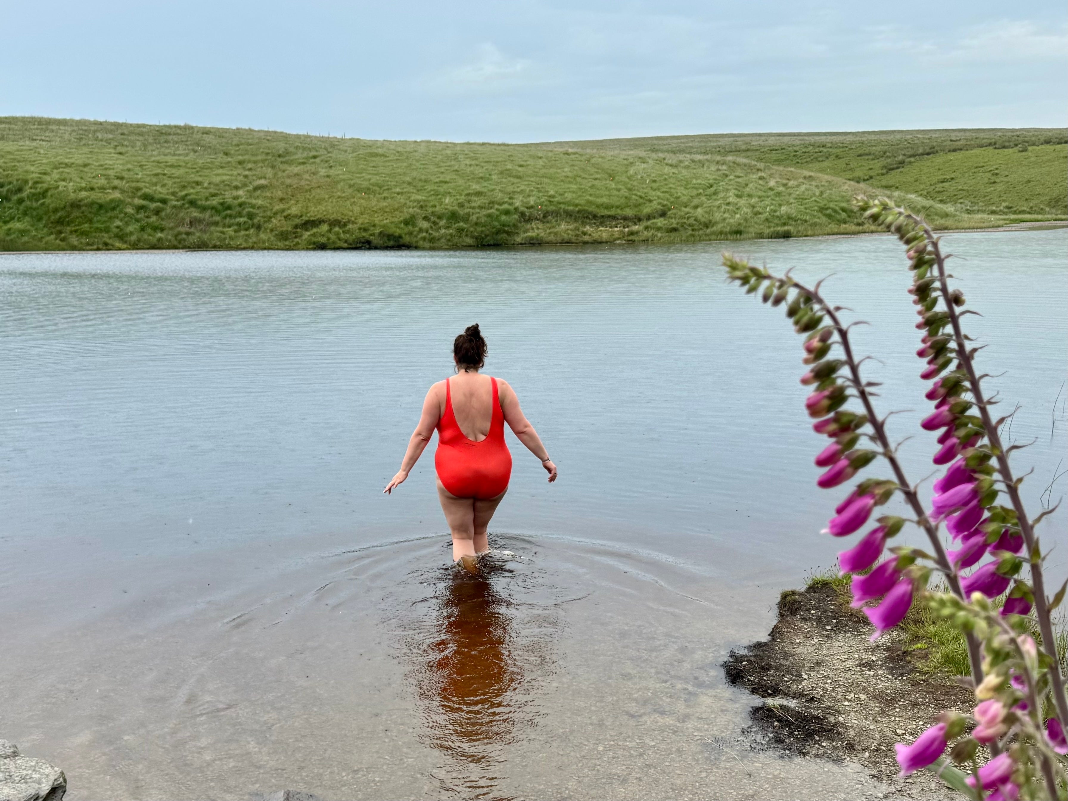 Wild swimming in cold water lake in the UK