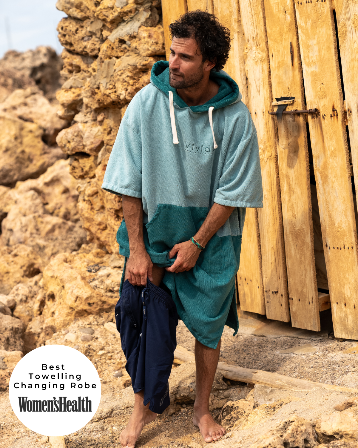 Lead_men - Man wears a Vivida Original Poncho Towel Changing Robe - Turquoise Teal / Pacific Teal