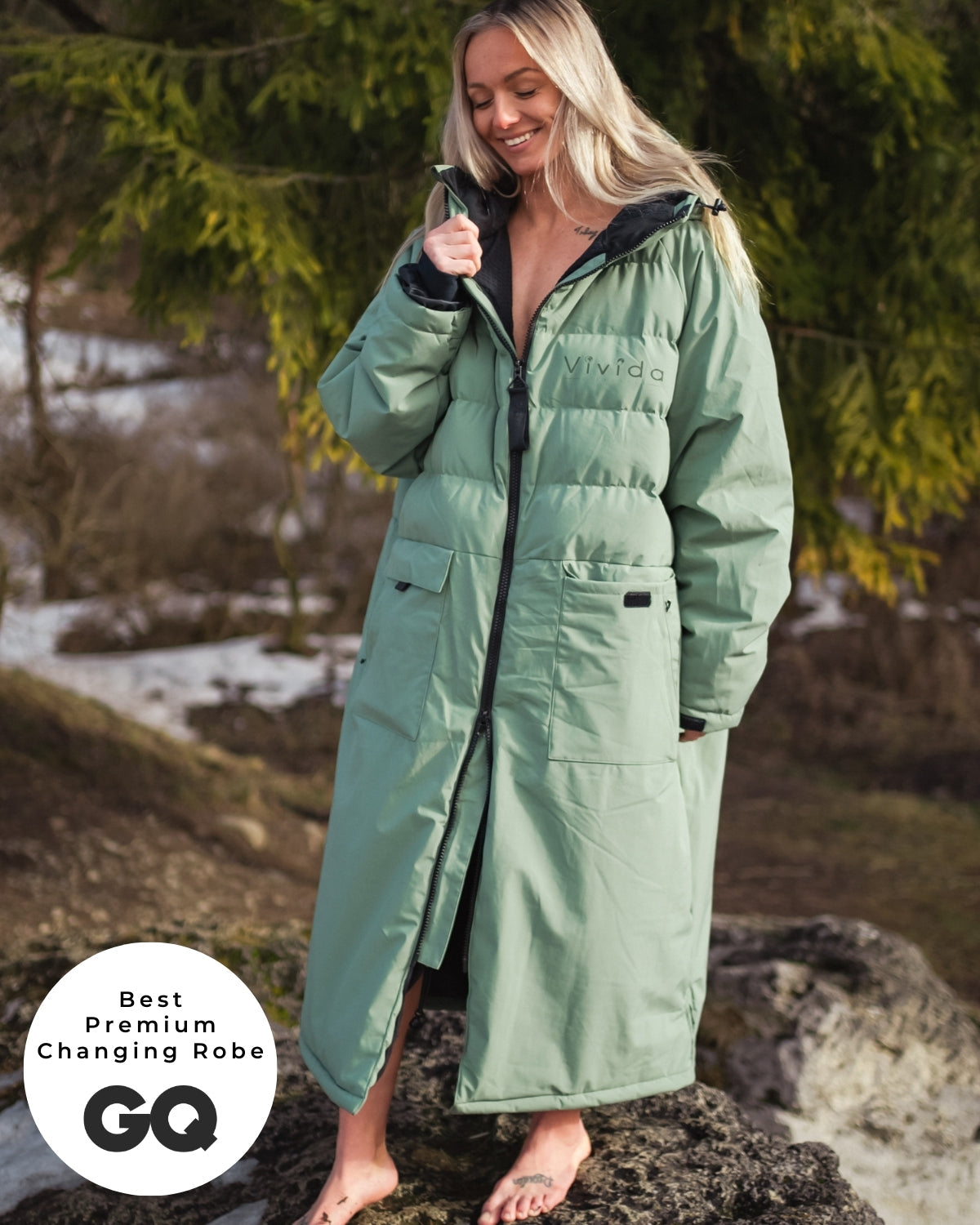 Lead_Women - woman wearing a Vivida All Weather Puffer Changing Robe in Aventurine Green