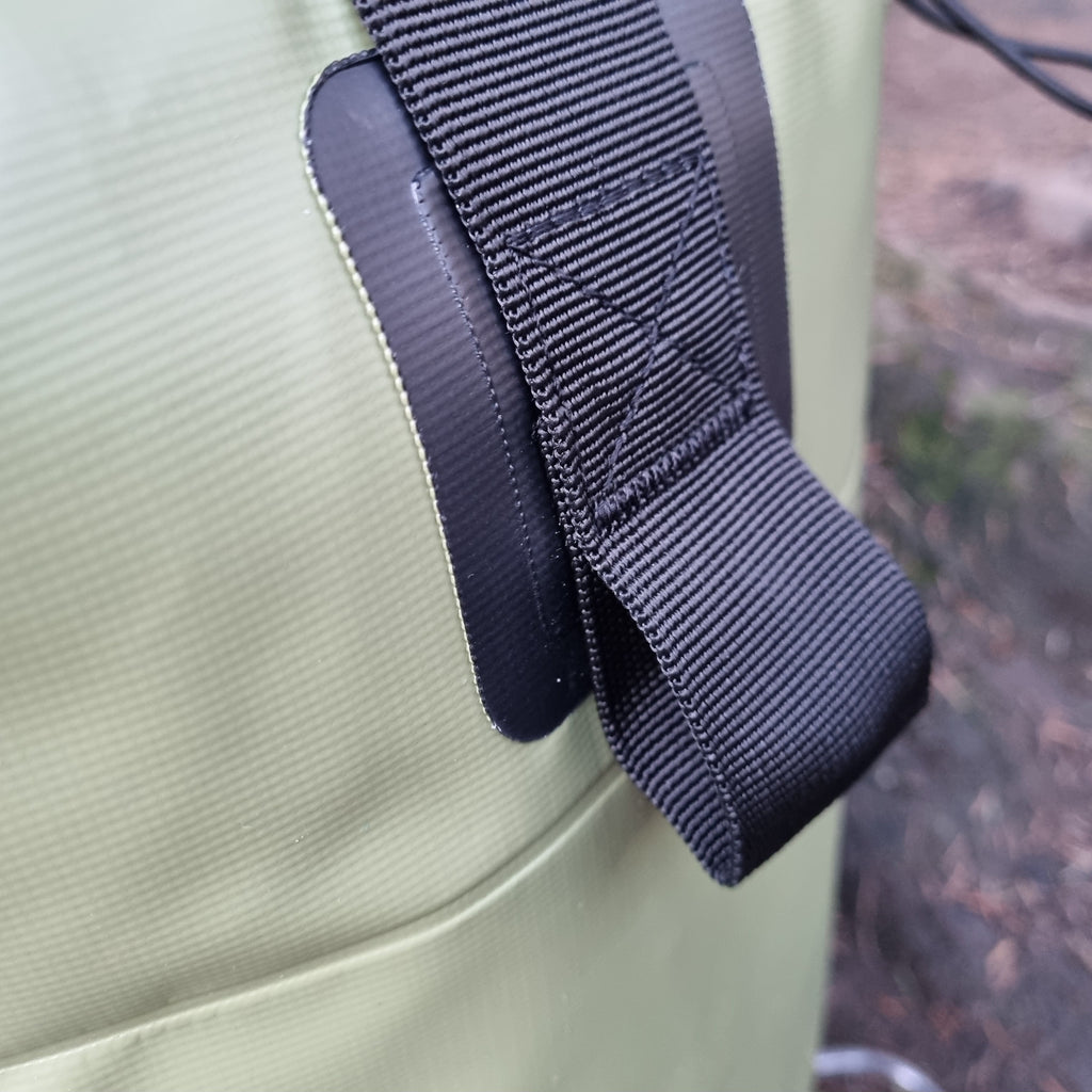 Close up of loop on the side of a Green Waterproof Swim Bag.