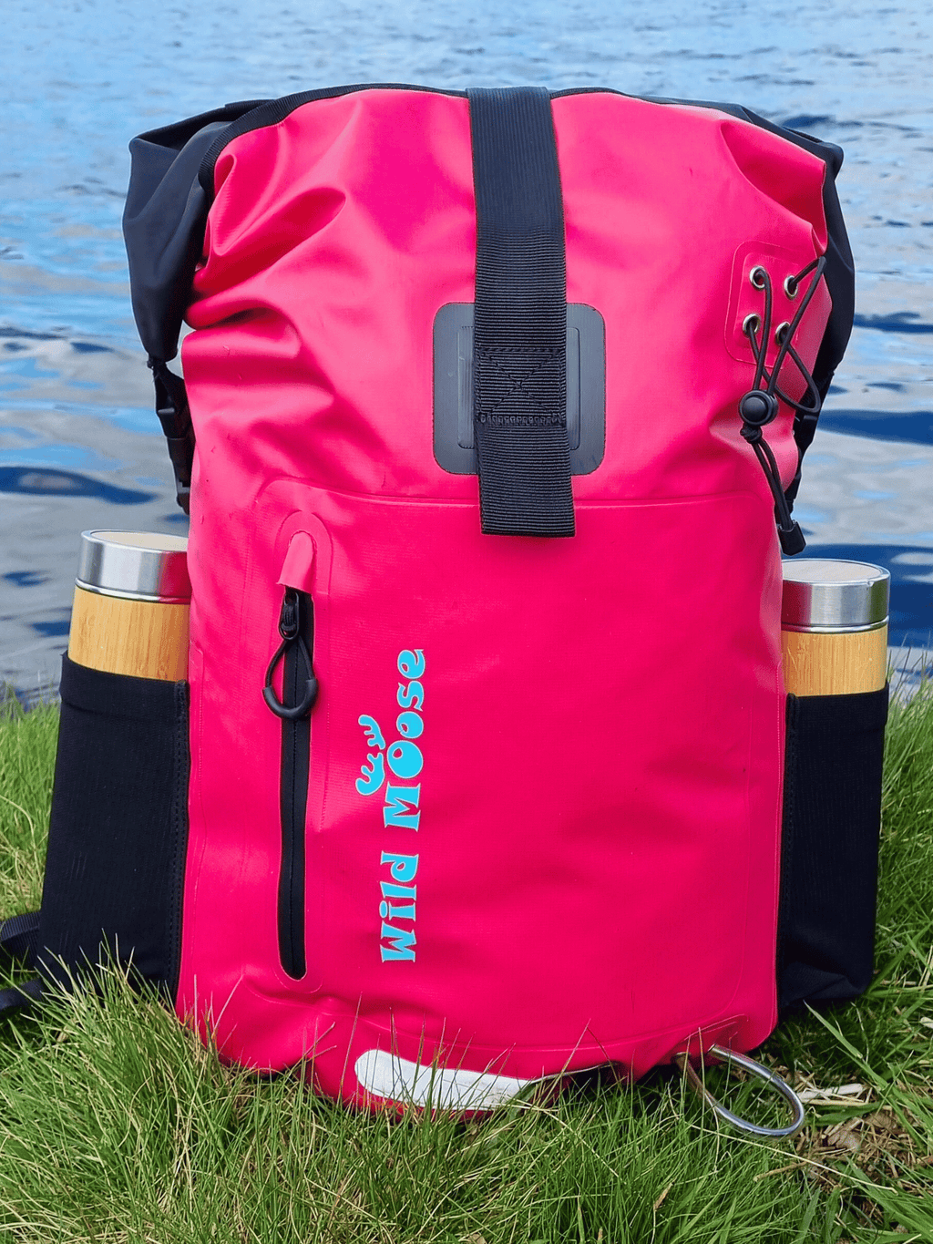 Bright Pink Wild Moose waterproof backpack for wild swimming and open water adventures.
