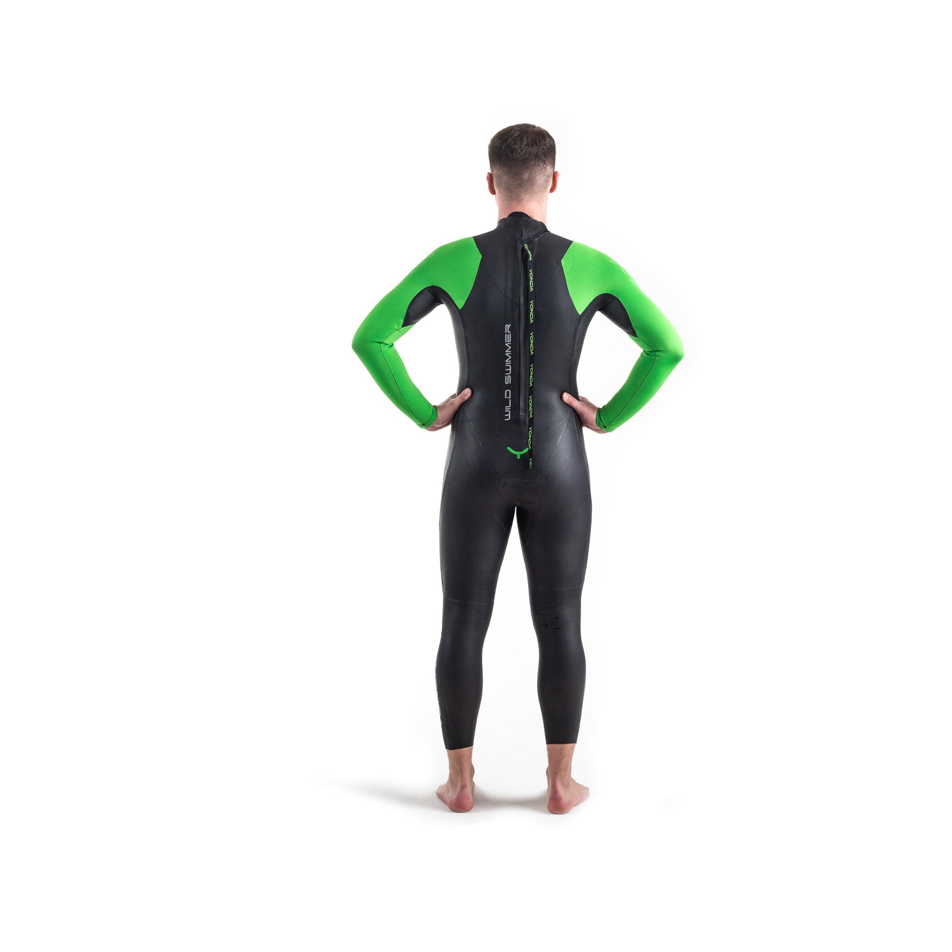 Back View of a man in the Spook Wetsuit by Yonda. Green sleeves.