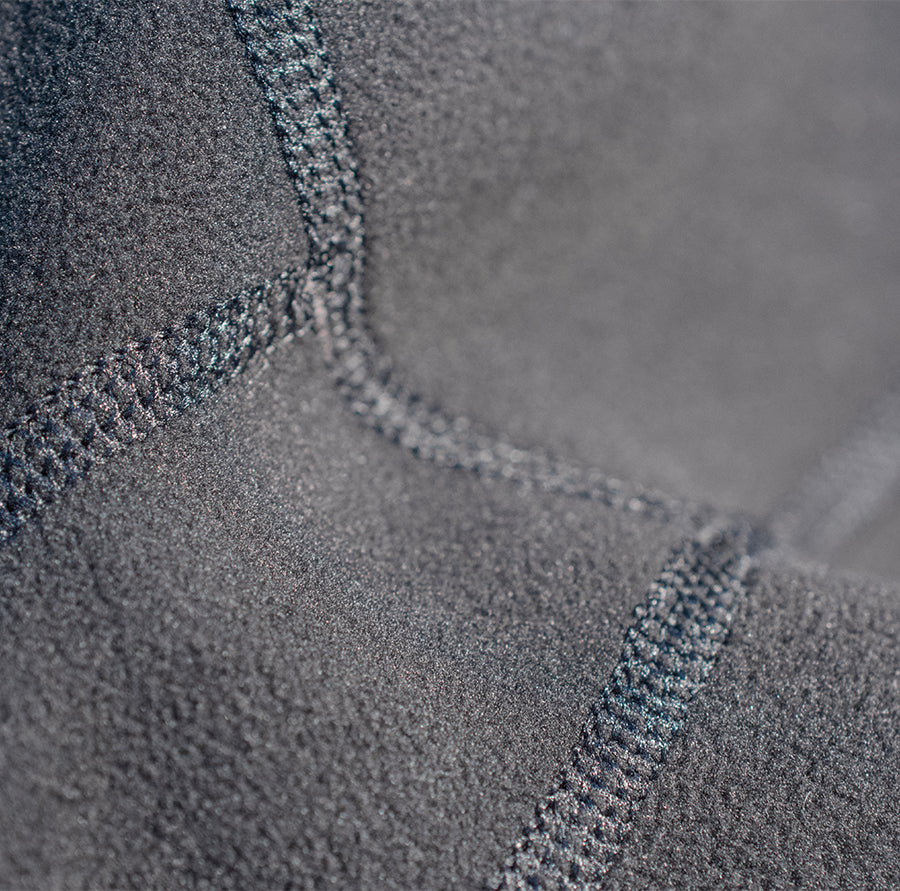 Fleece lining on the A woman wearing the Fourth Element - Women’s Thermocline Long Sleeve Swimsuit for Cold Water Immersion