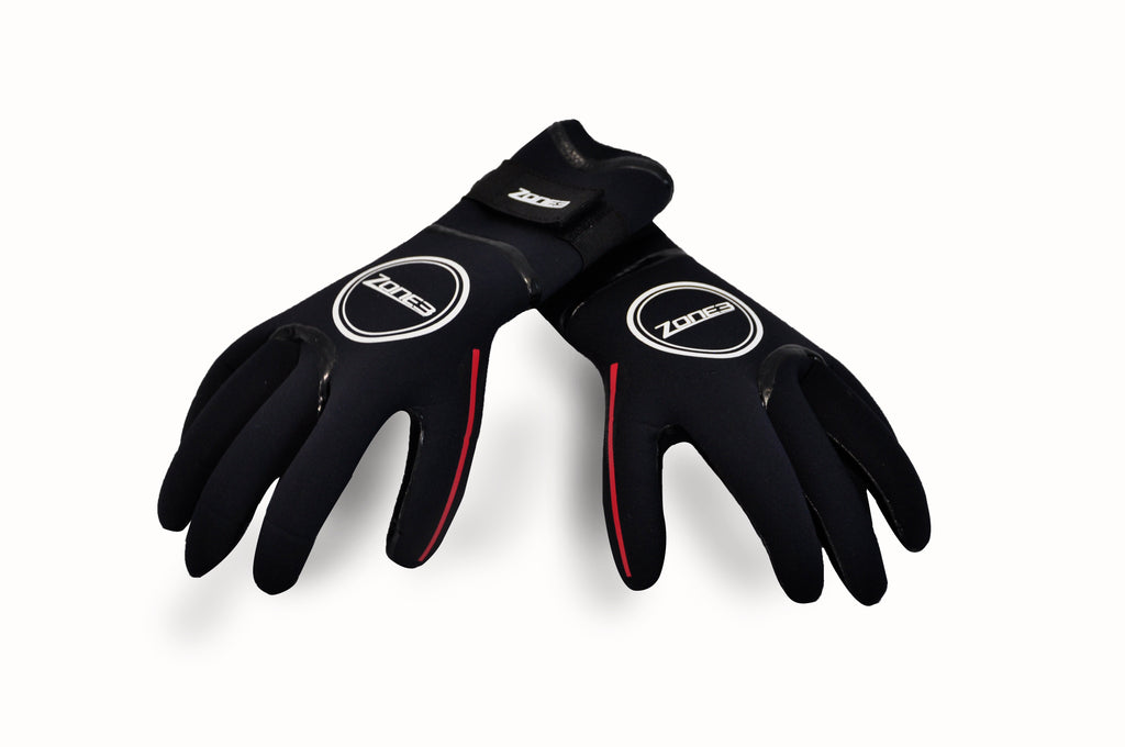 Two Zone 3 Heat Tech Warmth Neoprene Wetsuit Gloves for Wild Swimming . The gloves are lying down.